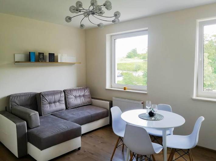 Appartement de vacances pour 2 personnes, avec jardin ainsi que vue et vue sur le lac