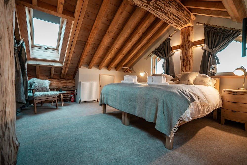 A fairy tale log cabin hand crafted from huge Douglas Fir trees. This rustic luxury cabin has oodles in Melrose, Scottish Borders