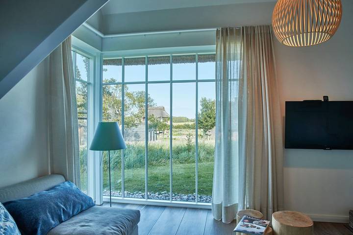 Ferienhaus für 8 Personen, mit Seeblick und Sauna sowie Ausblick und Garten, mit Haustier in Geltinger Bucht - 2