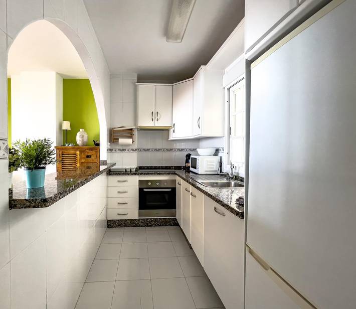 Entire apartment, First line Beach Apartment with Sea View, Wi-Fi, A/C, Terrace & Garden in Torrox Costa, Torrox
