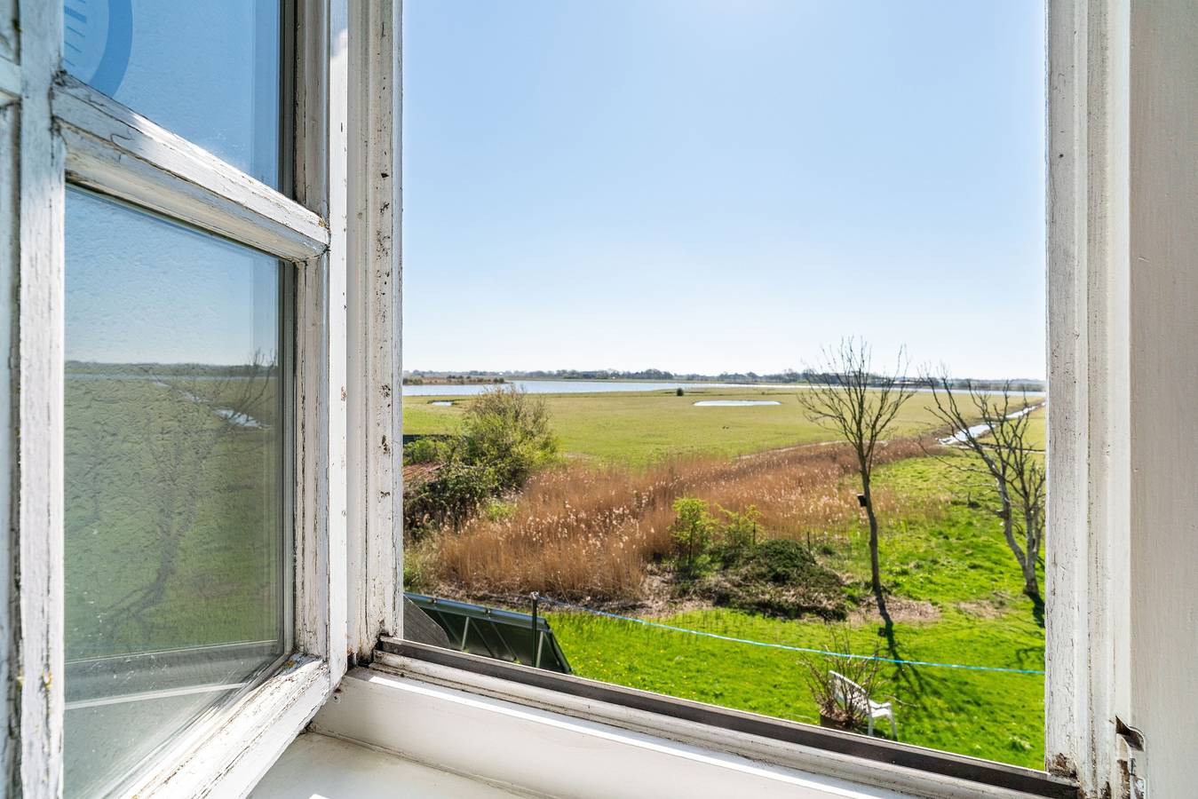 Ganze Wohnung, Apartment „Fewo Weitblick“ mit Seeblick, Gemeinschaftsgarten und Wlan in Pellworm, Nordseeküste