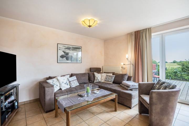 Ganze Wohnung, Nachhaltige Ferienwohnung "Lichtblick" mit privater Terrasse, privatem Garten, Wlan und Wallbox in Brenkenhagen, Grömitz