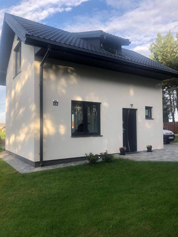 Dom dla 6 osób, z Jacuzzi i Taras oraz Ogród i Sauna w Elk