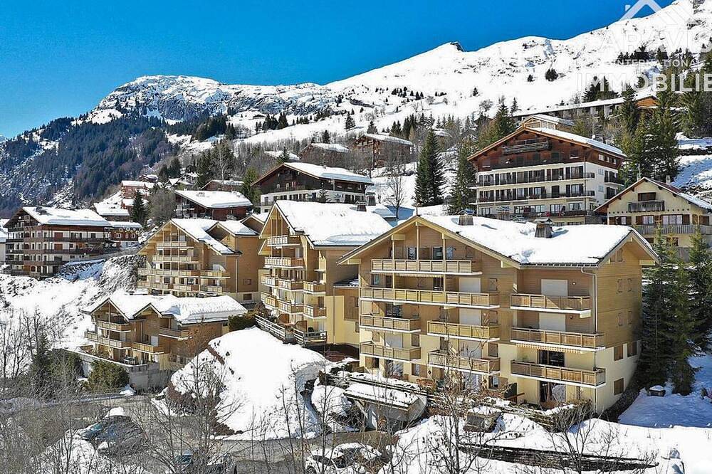 Apartamento entero, Apartamento 6-8 pers, 2 hab + altillo, centro, frente a pistas, wifi, garaje in Chinaillon, Le Grand-Bornand