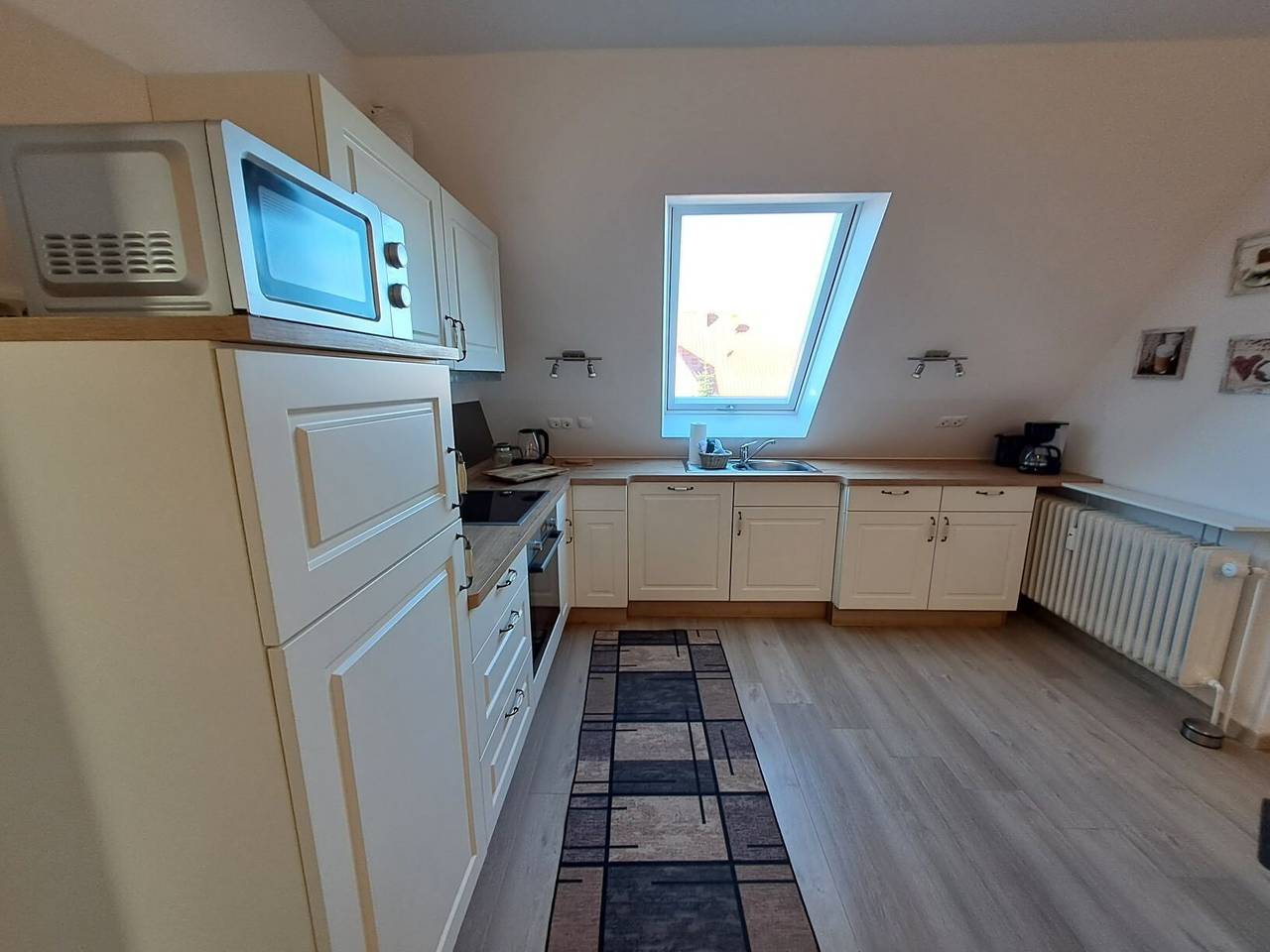 Geheel appartement, Appartement 'Fewo Tief Blick' met privéterras en wifi in Dornum (Stad), Dornum