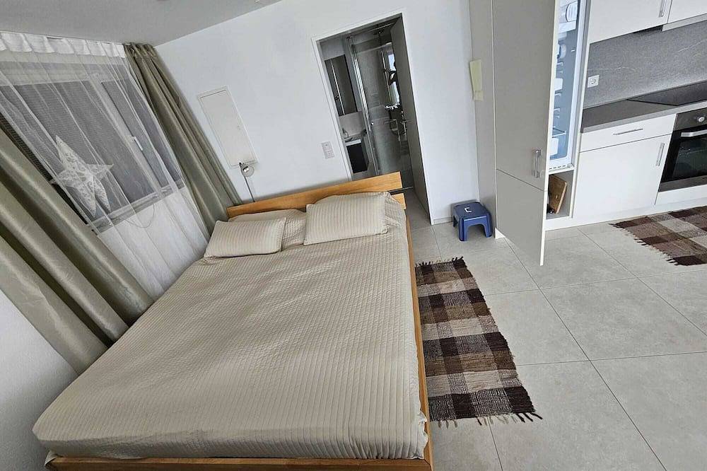 Geheel appartement, Appartement Niesenblick aan het meer van Thun in Sigriswil, Meer van Thun