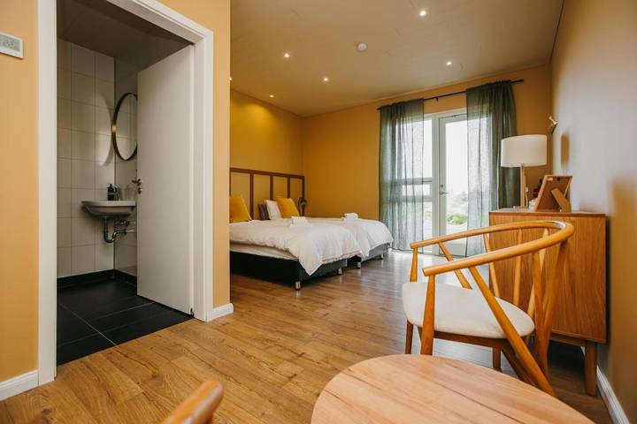 Maison d’hôte pour 2 personnes, avec terrasse ainsi que jardin et vue dans Flúðir