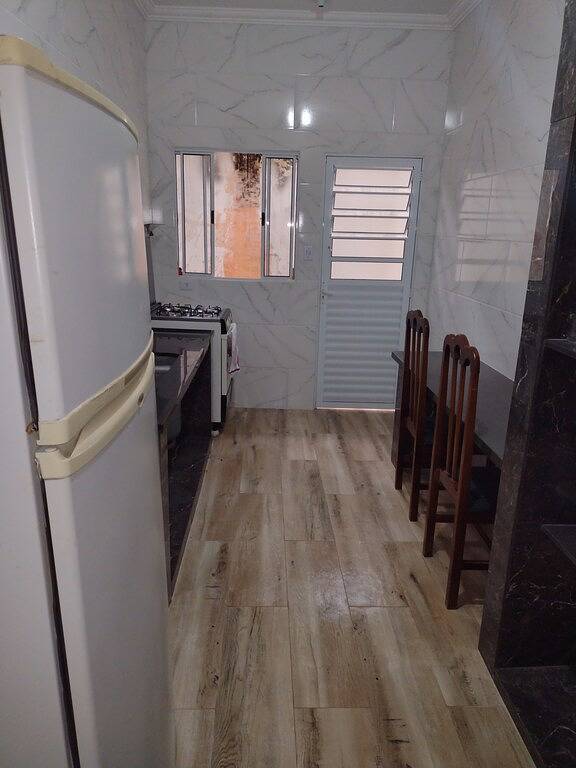 Fuß im Sandhaus Vila Caiçara (Praia Grande) in Solemar, Praia Grande