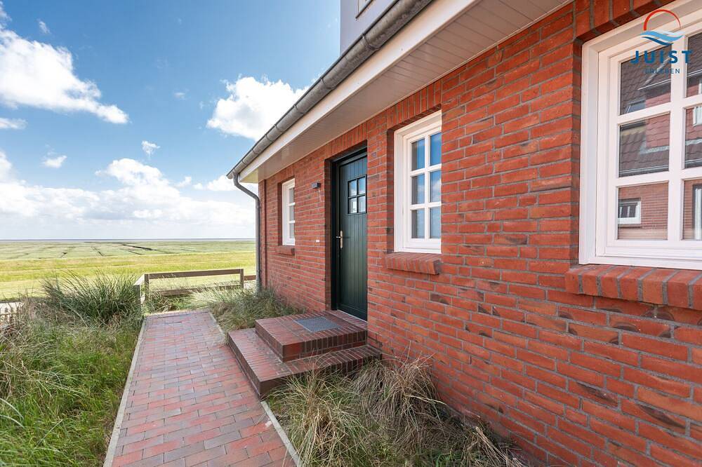 Stilvoll ausgestattete Ferienhaushälfte mit Terrasse am Watt. — Bild 4