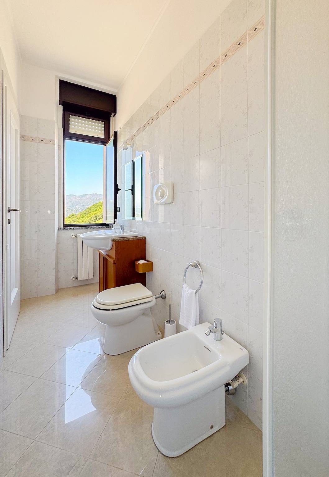 Camera familiare con bagno privato e vista mare in Gonnesa, Iglesiente