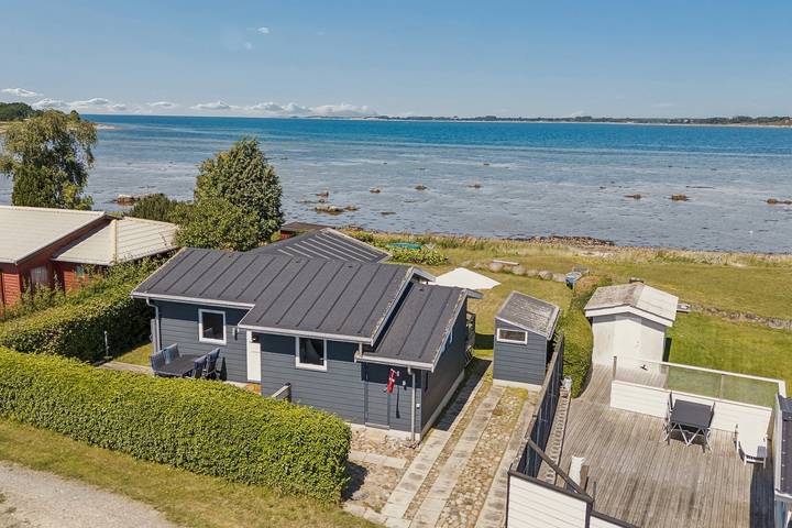 Ferienhaus für 4 Personen, mit Terrasse und Garten sowie Ausblick und Seeblick in Mesinge