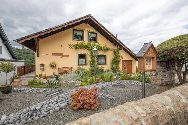 Ferienwohnung für 2 Personen, mit Terrasse und Garten sowie Seeblick und Ausblick in Einruhr