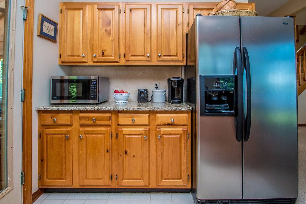 Waterfront home in Moultonborough with sandy beach and dock in Moultonborough, Lake Winnipesaukee