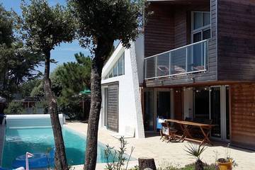 Cottage pour 8 personnes, avec balcon et jardin dans Plage de Tanchet