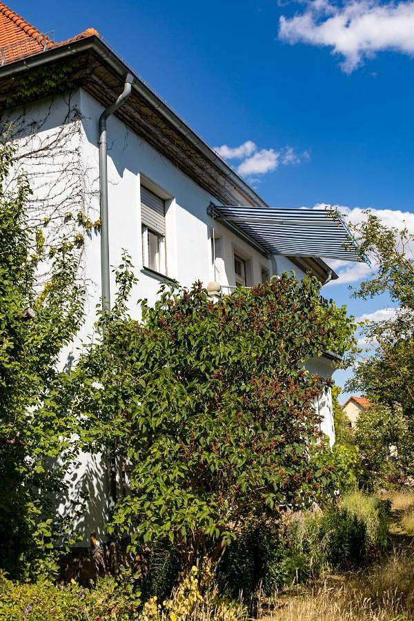 Ferienwohnung für 4 Personen, mit Balkon und Terrasse sowie Garten und Ausblick in Bad Belzig