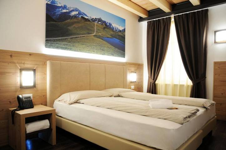 Hôtel pour 2 personnes, avec terrasse ainsi que jacuzzi et sauna, adapté aux familles