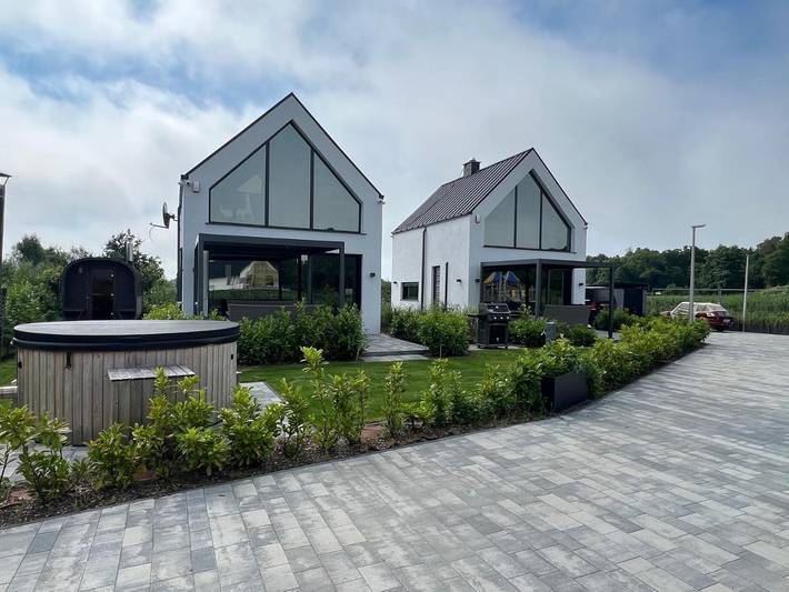 Dom wakacyjny dla 5 osób, z sauna i ogród oraz jacuzzi w Chłopy