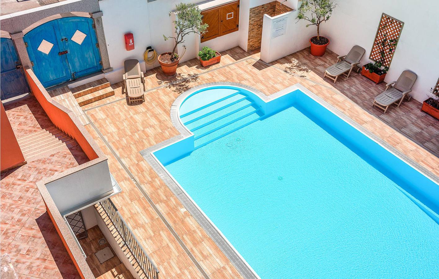 Ganze Ferienwohnung, Poolside Haven: Klimaanlage, Parkplatz, Küche und Internet - 2,5 km zum Strand in Santa Teresa di Gallura, Santa Teresa Gallura (Gemeinde)