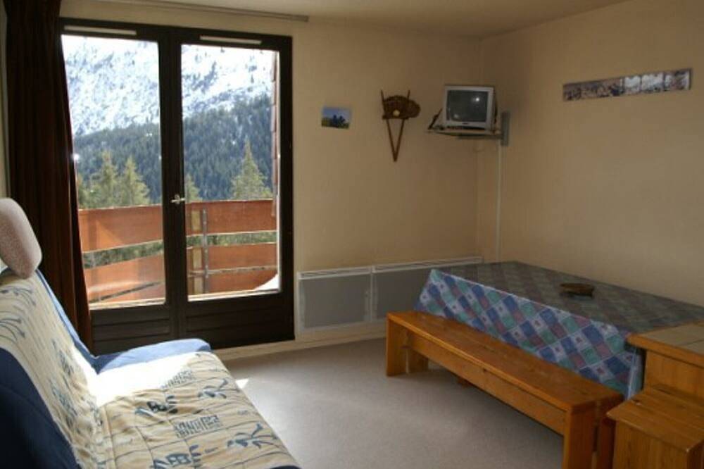 Ganze Wohnung, Gemütliche Wohnung mit Balkon, direkt an den Pisten, 50m vom Skilift, 2 Schlafzimmer, 4 Schlafplätze in La Ferrière, Le Pleynet