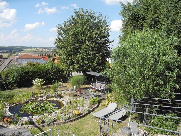 Ferienwohnung für 3 Personen, mit Terrasse und Garten sowie Ausblick