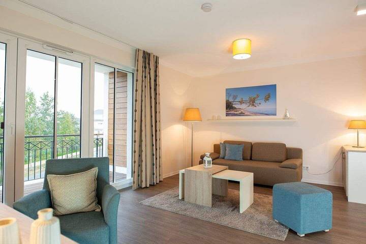 Ferienwohnung für 4 Personen, mit Balkon und Pool sowie Sauna in Börgerende-Rethwisch