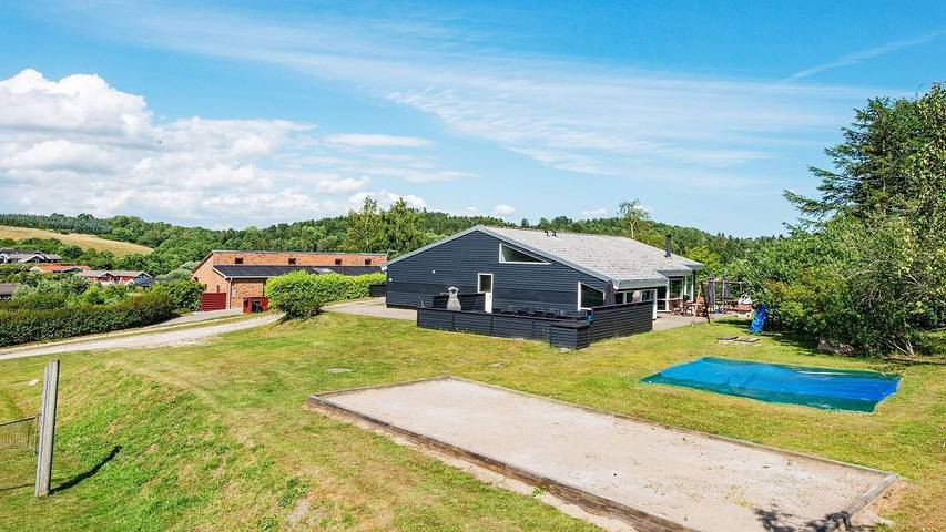 Ferienhaus für 12 Personen, mit Terrasse und Whirlpool sowie Pool und Sauna in Lyngsbæk Strand
