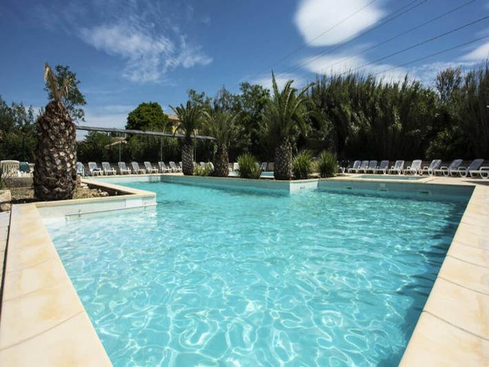 Appartement de vacances pour 6 personnes, avec piscine et jardin ainsi que sauna et terrasse, animaux acceptés