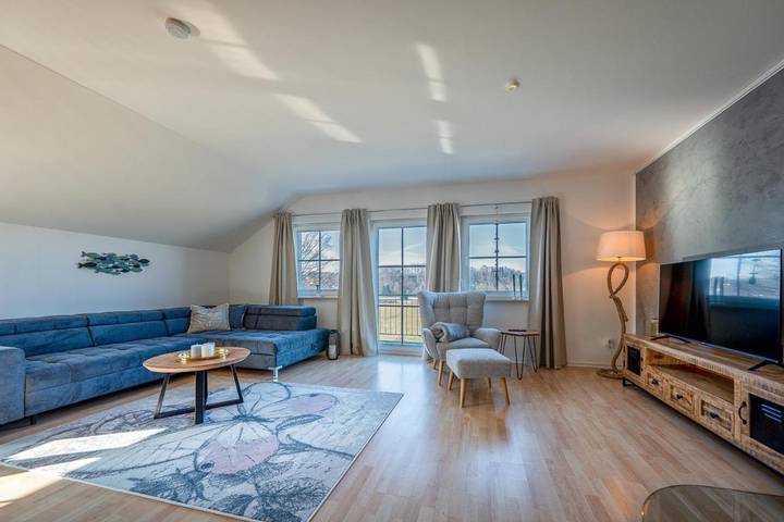 Ferienwohnung für 5 Personen, mit Terrasse und Garten sowie Sauna und Ausblick