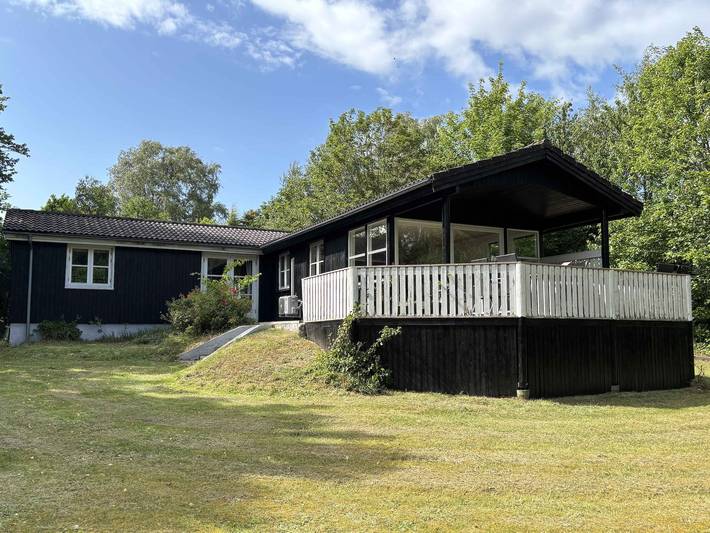 Ferienhaus für 8 Personen, mit Seeblick und Garten
