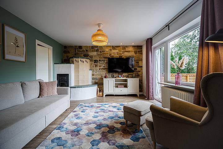 Ferienhaus für 8 Personen, mit Balkon und Terrasse sowie Garten und Seeblick in Wittensee