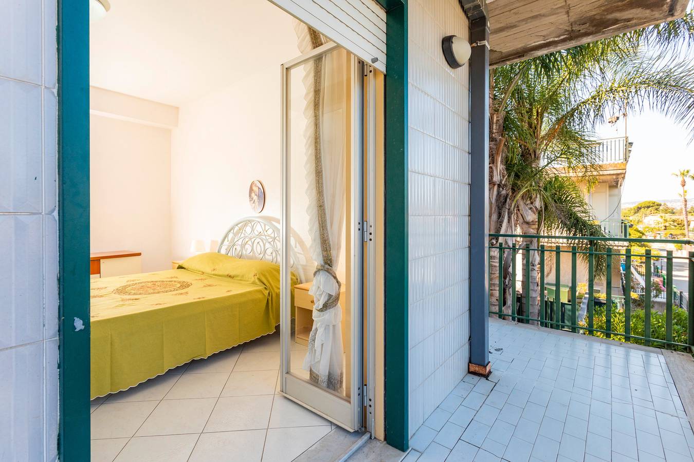 Apartamento entero, Apartamento 'I Ciottoli Dello Ionio - Apt 3' con vistas a las montañas, terraza compartida y balcón in Fondachello, Provincia de Catania
