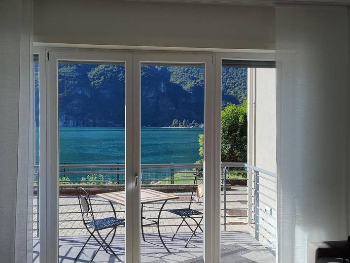 Ferienwohnung für 4 Personen, mit Ausblick und Garten sowie Seeblick