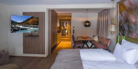 Hôtel pour 4 personnes, avec jacuzzi et jardin ainsi que sauna et terrasse à Huben