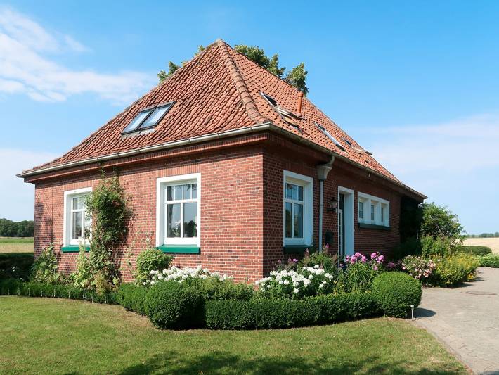 Ferienwohnung für 3 Personen, mit Terrasse und Garten sowie Ausblick in Bunde