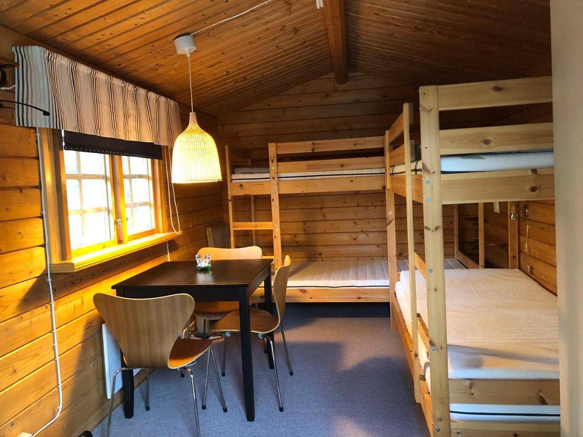 Timber cottages with jacuzzi and sauna near lake Vänern in Vänern