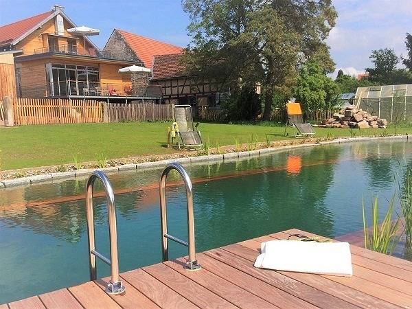 Ferienwohnung für 2 Personen, mit Terrasse und Garten sowie Pool und Sauna in Königsberg in Bayern