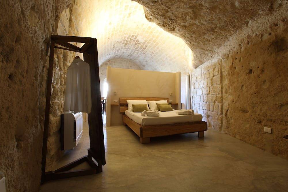 Appartamento intero, Suite in grotta con terrazza e vista sui Sassi di Matera in Sassi di Matera, Matera