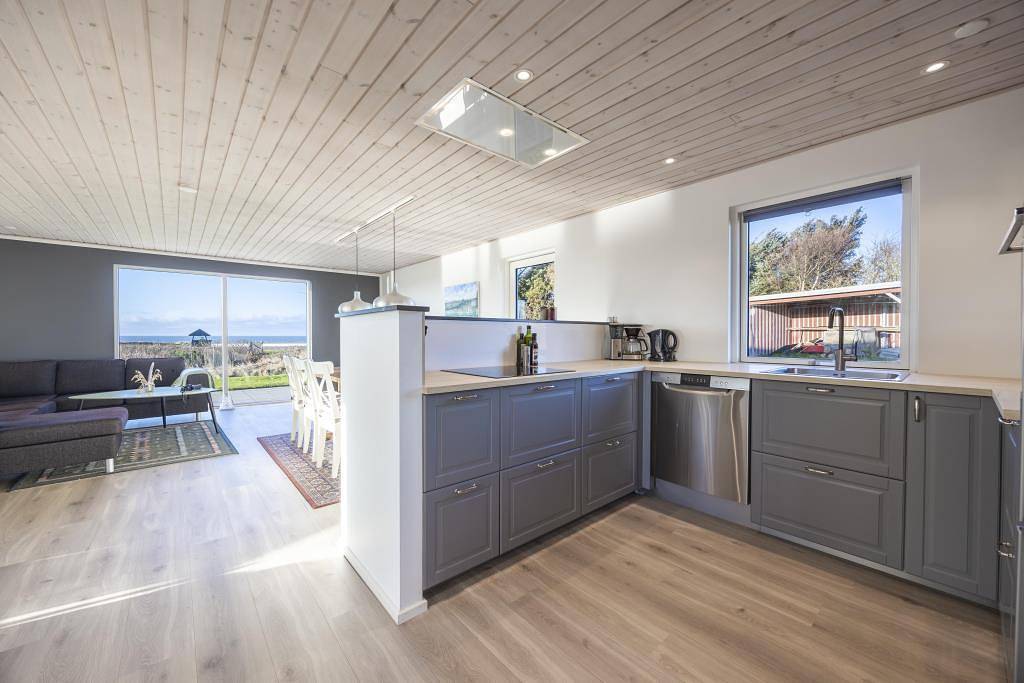 Wunderschönes und einladendes Ferienhaus mit herrlichem Meer- und Seeblick in Nr. Lyngby, Hjørring und Umgebung