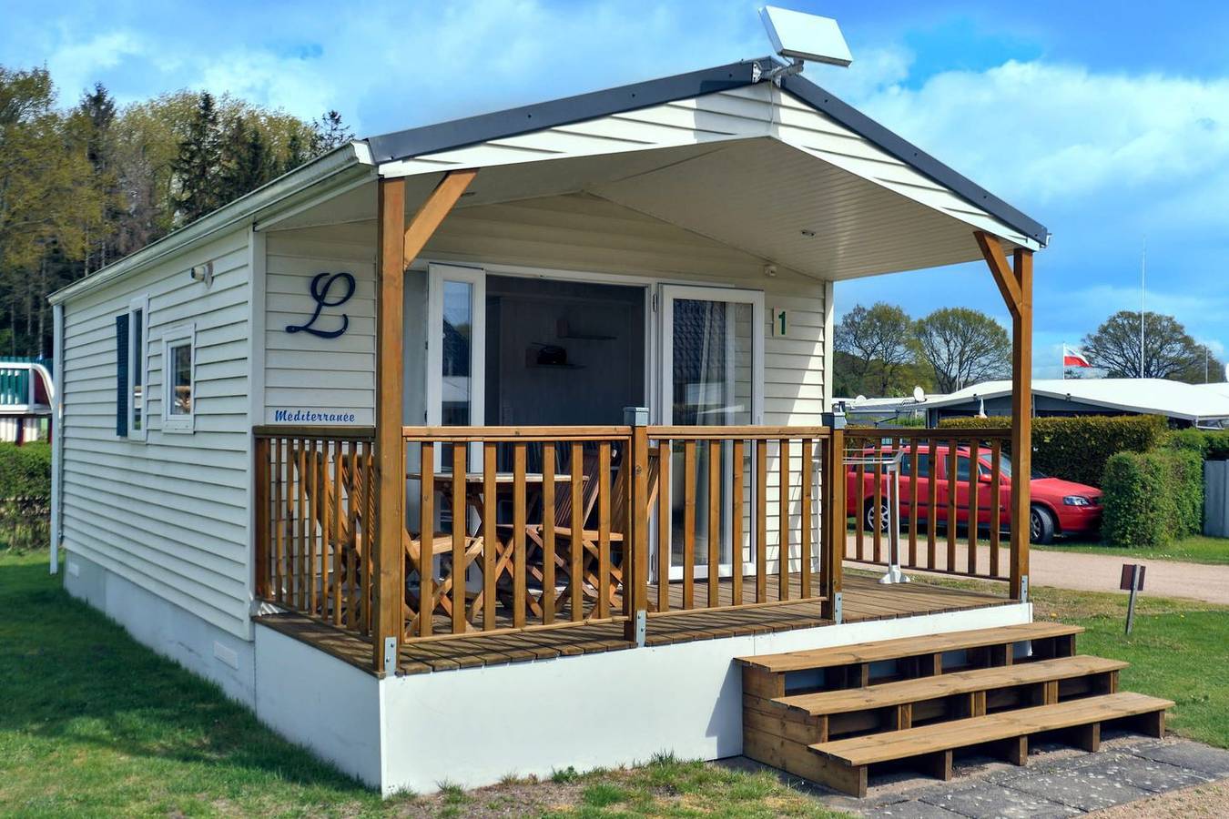 Mobilheim Méditerranée mit Terrasse für 4 Personen im Ferienpark Am Waldrand in Südstrand Pelzerhaken, Ostholstein