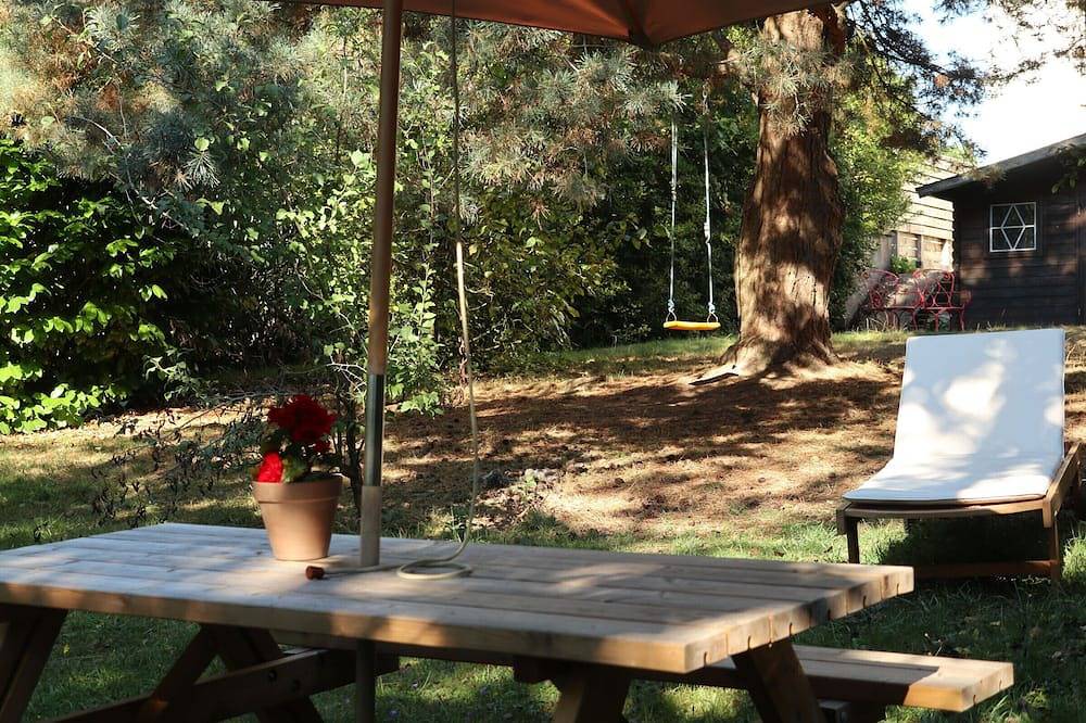 Apartamento encantador con jardín, cerca del centro de la ciudad y bien comunicado. in Chantraine, Región de Épinal