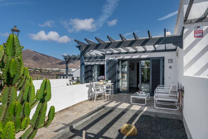Casa Bidasoa 35: Vista mare, piscina condivisa e Wi-Fi a Playa Blanca in Playa Blanca, Yaiza