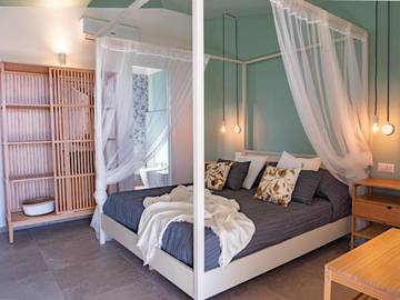 Chambre d’hôte pour 2 personnes, avec terrasse ainsi que jardin et vue à San Teodoro