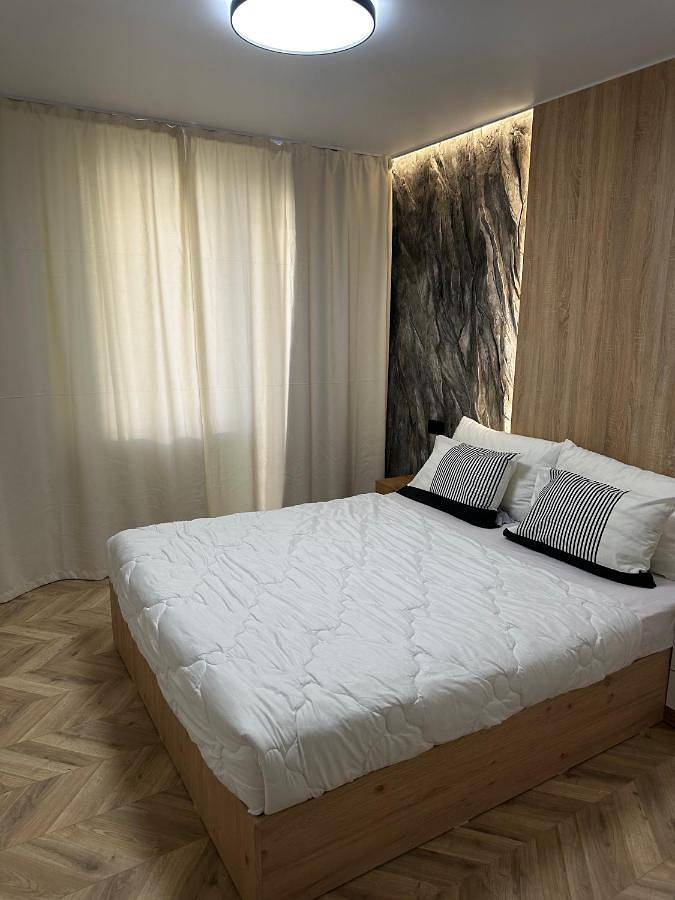 Appartement de vacances pour 3 personnes, avec jardin ainsi que vue et balcon