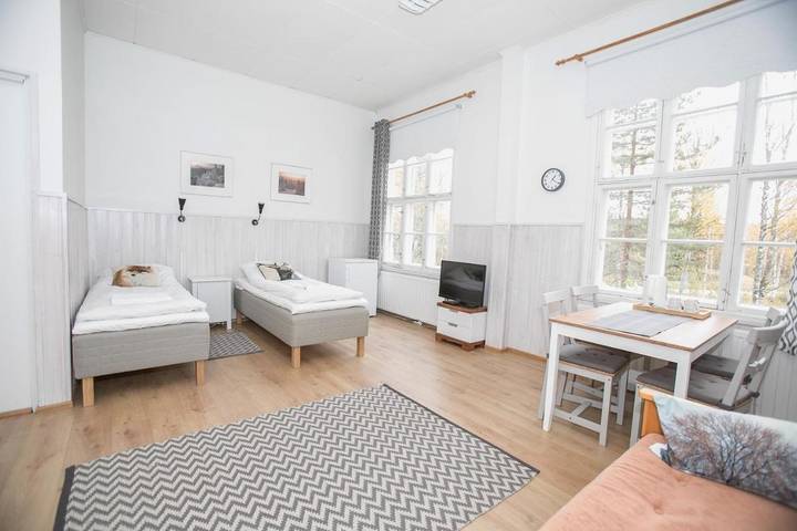 Ferienhaus für 4 Personen, mit Terrasse und Whirlpool sowie Garten und Sauna in Juuka