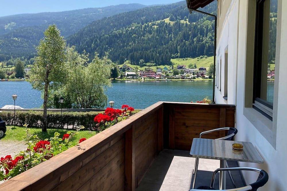 Wohnung mit Balkon, Schlafzimmer, Seeblick 11 - Aparthotel Seebrauer am Afritzer in Feld am See, Villach-Land