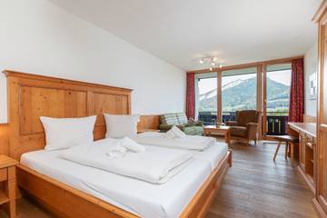 Ferienwohnung für 2 Personen, mit Sauna und Garten sowie Balkon und Ausblick in Bad Goisern am Hallstättersee