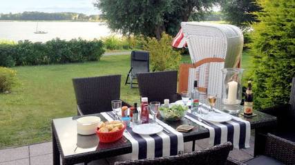 Ferienhaus für 4 Personen, mit Ausblick und Seeblick sowie Garten und Terrasse in Mönchgut-Granitz