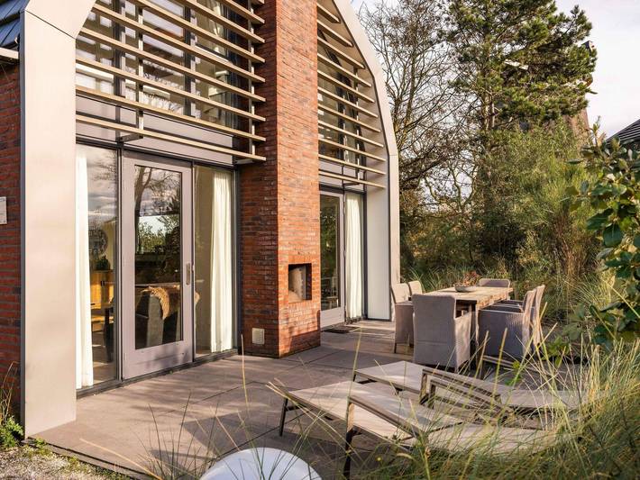 Ferienhaus für 6 Personen, mit Balkon/Terrasse und Terrasse sowie Garten und Sauna