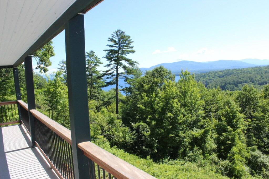 Home with beach access, incredible water views, washer/dryer & golf nearby in Holderness, Squam Lake