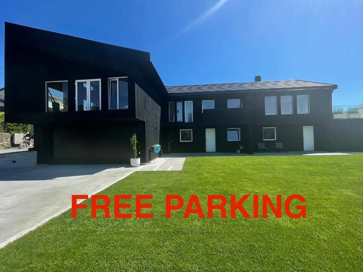 Ferienwohnung für 4 Personen, mit Balkon und Terrasse sowie Garten und Ausblick in Kristiansand